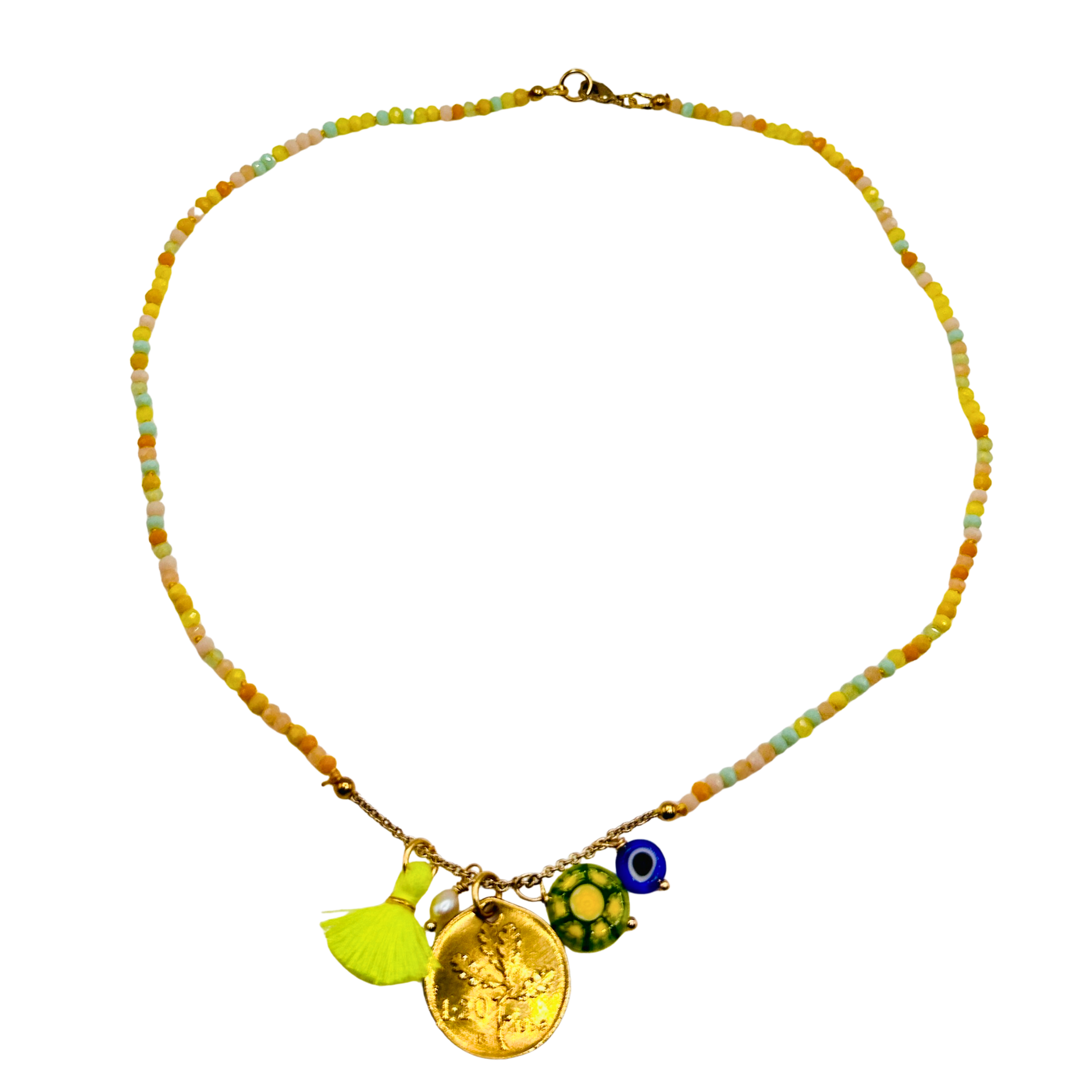 Necklace with colorful beads and charms on a white background