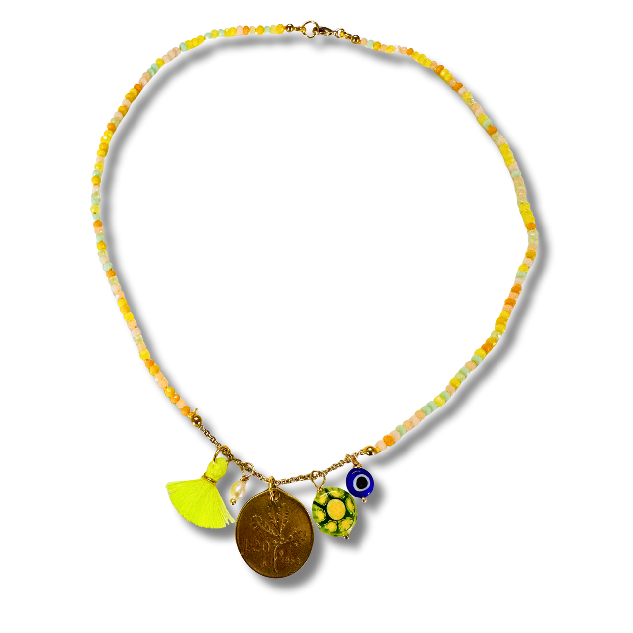 Necklace with colorful beads and charms on a white background