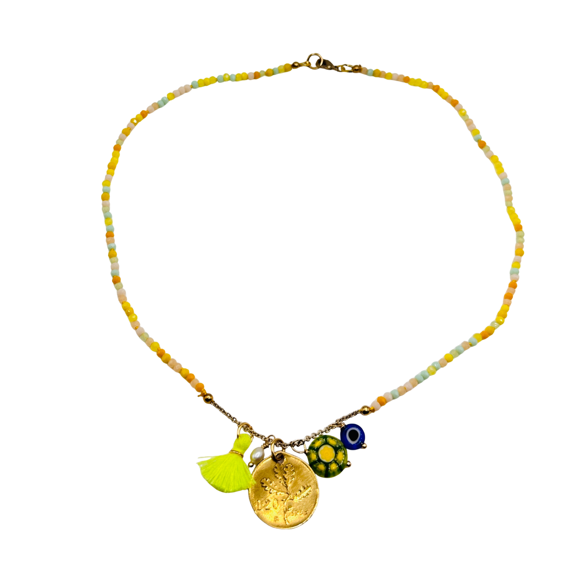 Necklace with colorful beads and charms on a white background