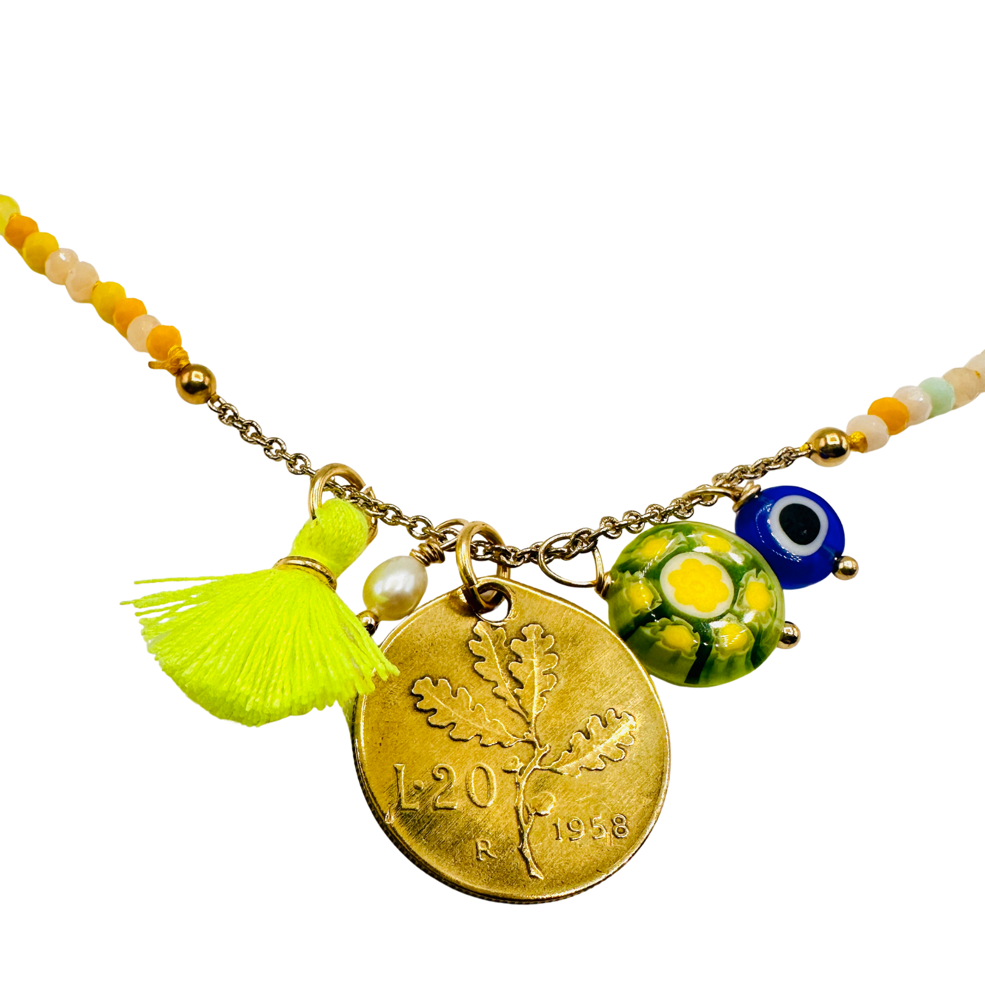Necklace with gold coin, tassel, and colorful beads on a white background
