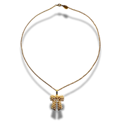 Gold necklace with a cross pendant on a white background