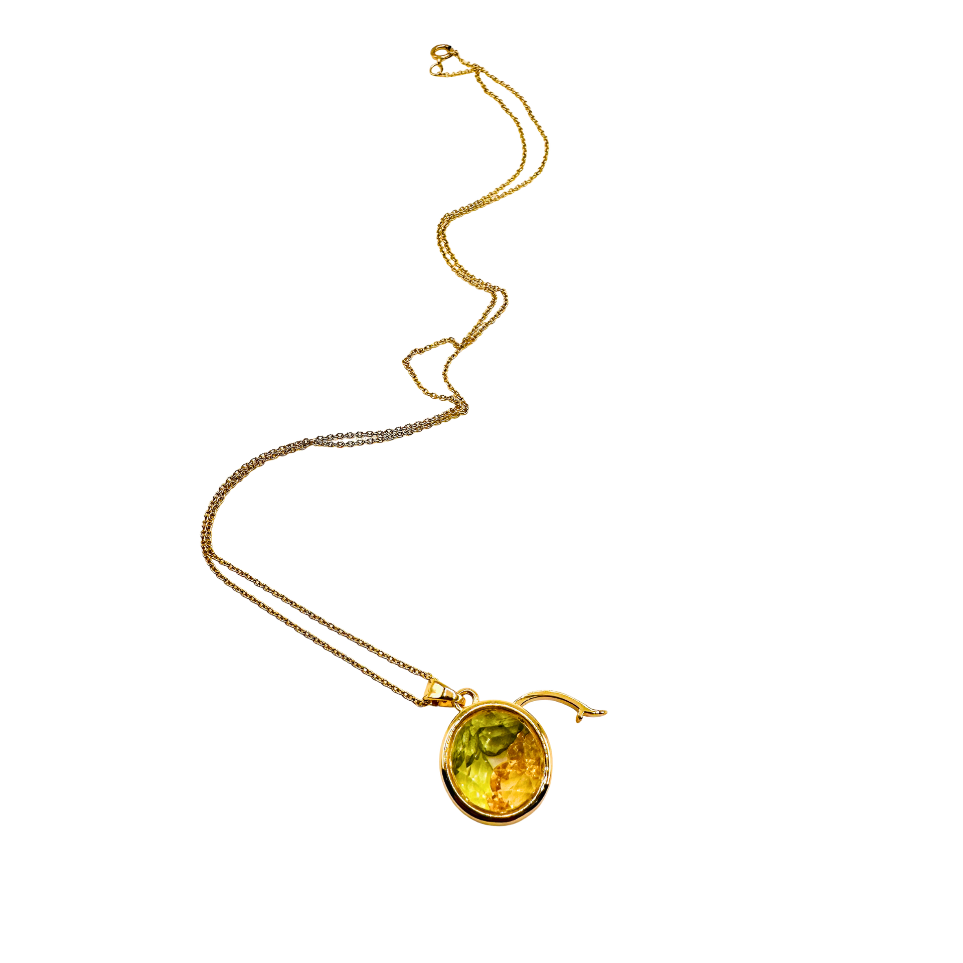 Gold necklace with a green gemstone pendant on a white background