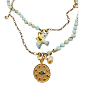 Necklace with various charms on a white background