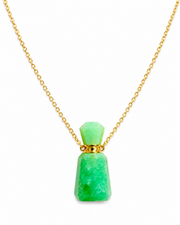 A gold chain necklace featuring a pendant made of a faceted light green gemstone on the top and a larger green stone on the bottom, separated by a small gold ring, shown on a white background.