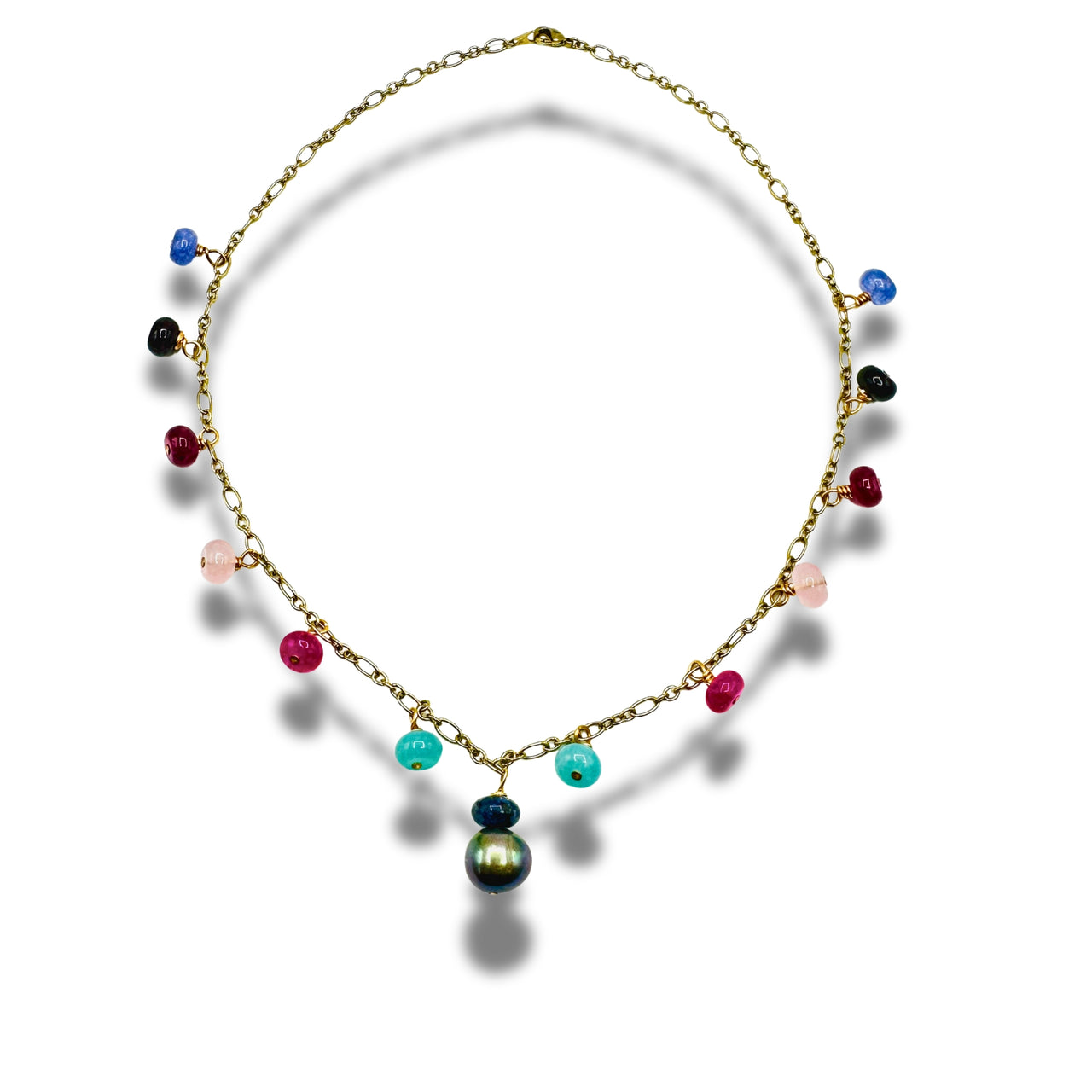 A gold-plated necklace with multicolored dangle gemstones and pearls.