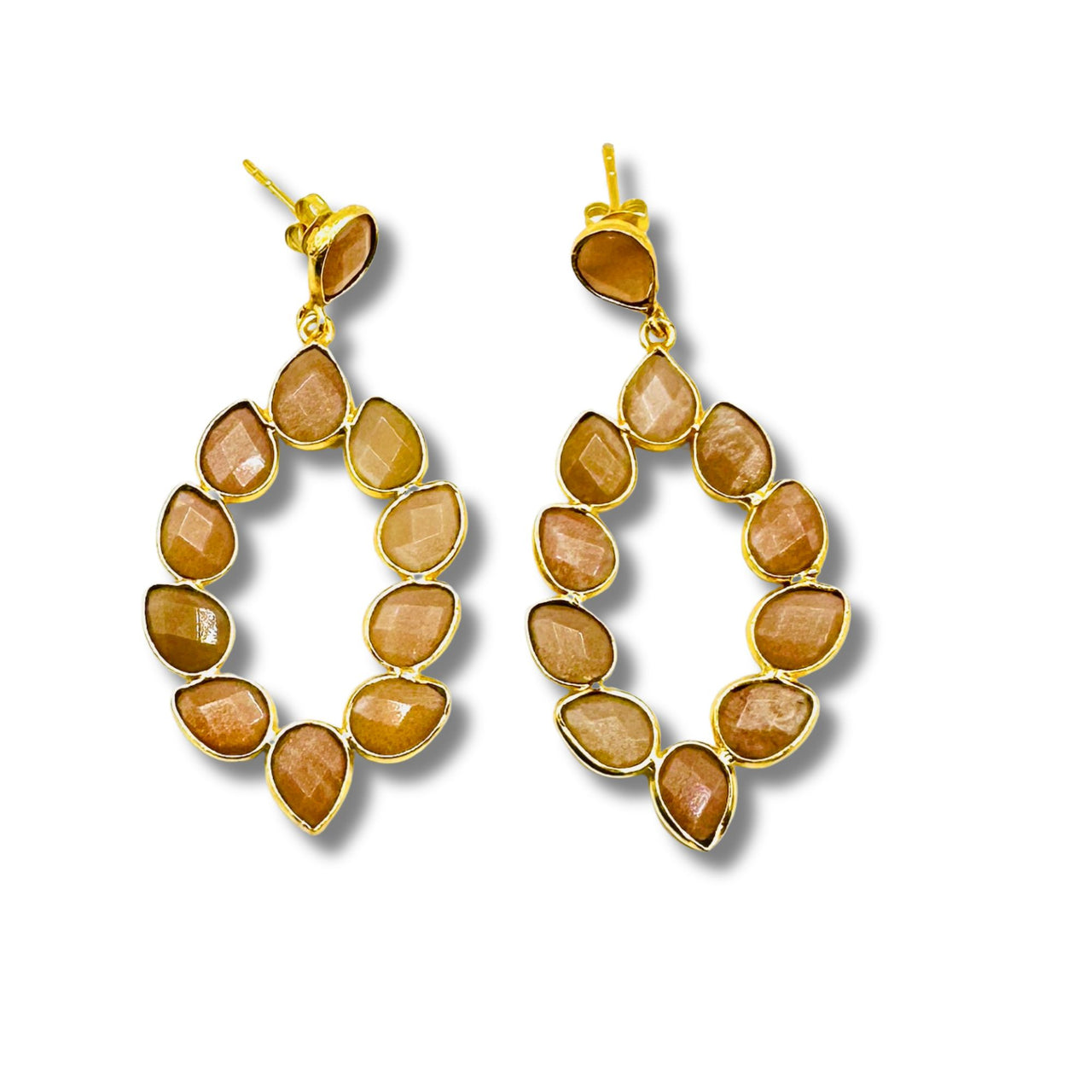 A pair of gold-plated brass bezel set cascading earrings with peach moonstone inlays.