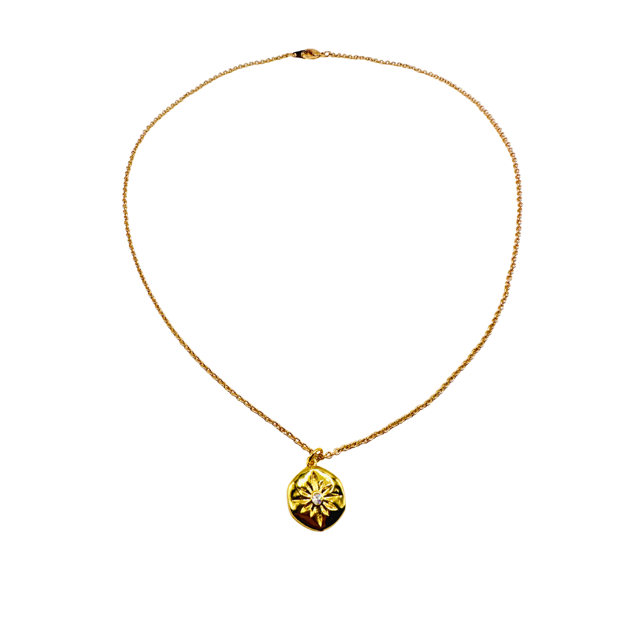 Gold necklace with a pendant on a white background