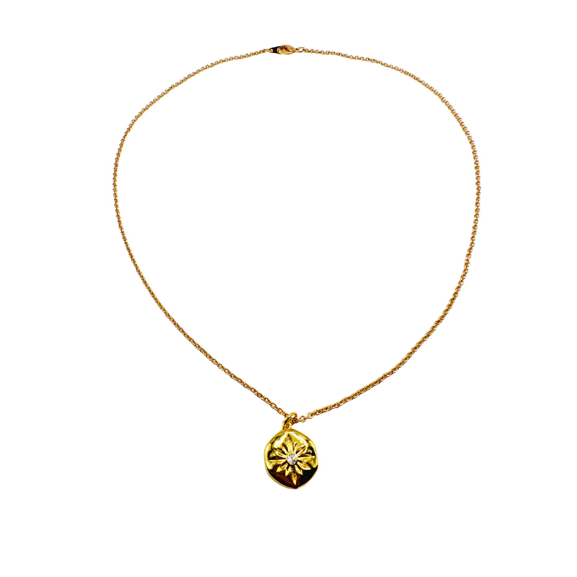 Gold necklace with a pendant on a white background