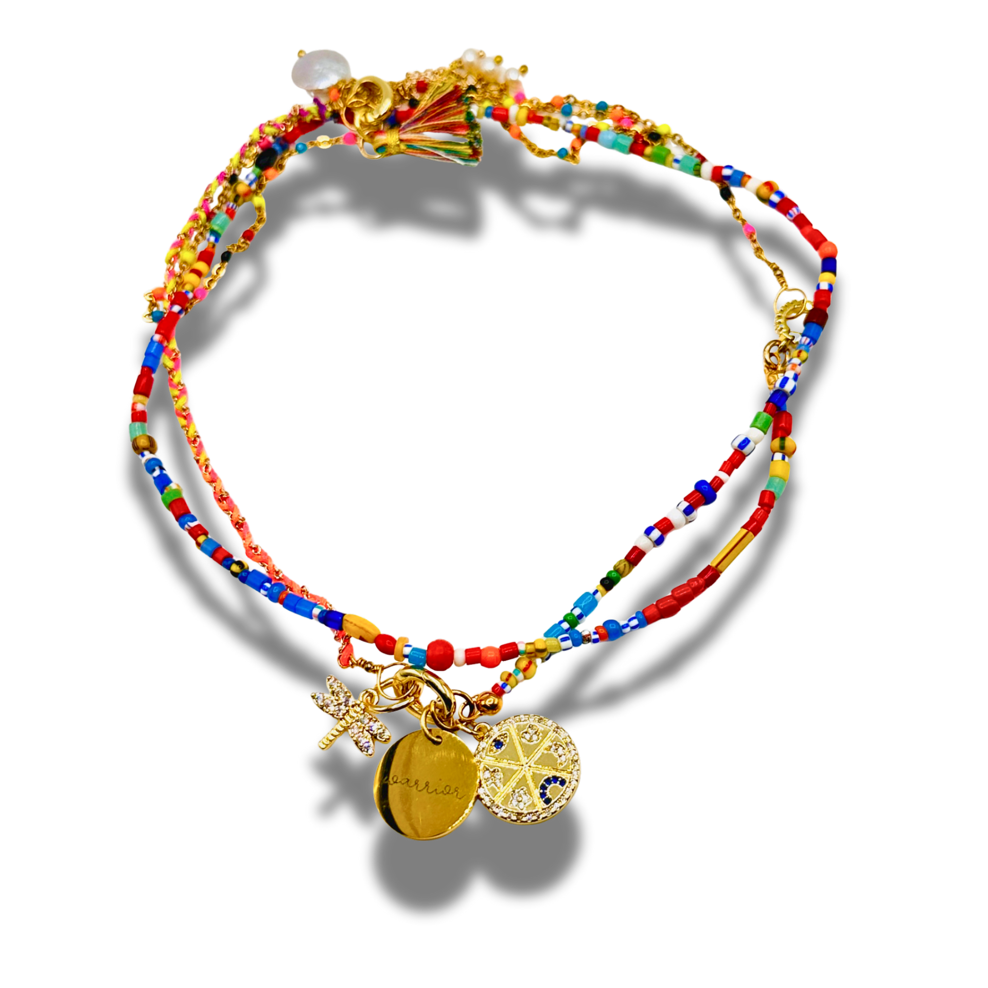 Colorful beaded bracelet with gold charms on a white background