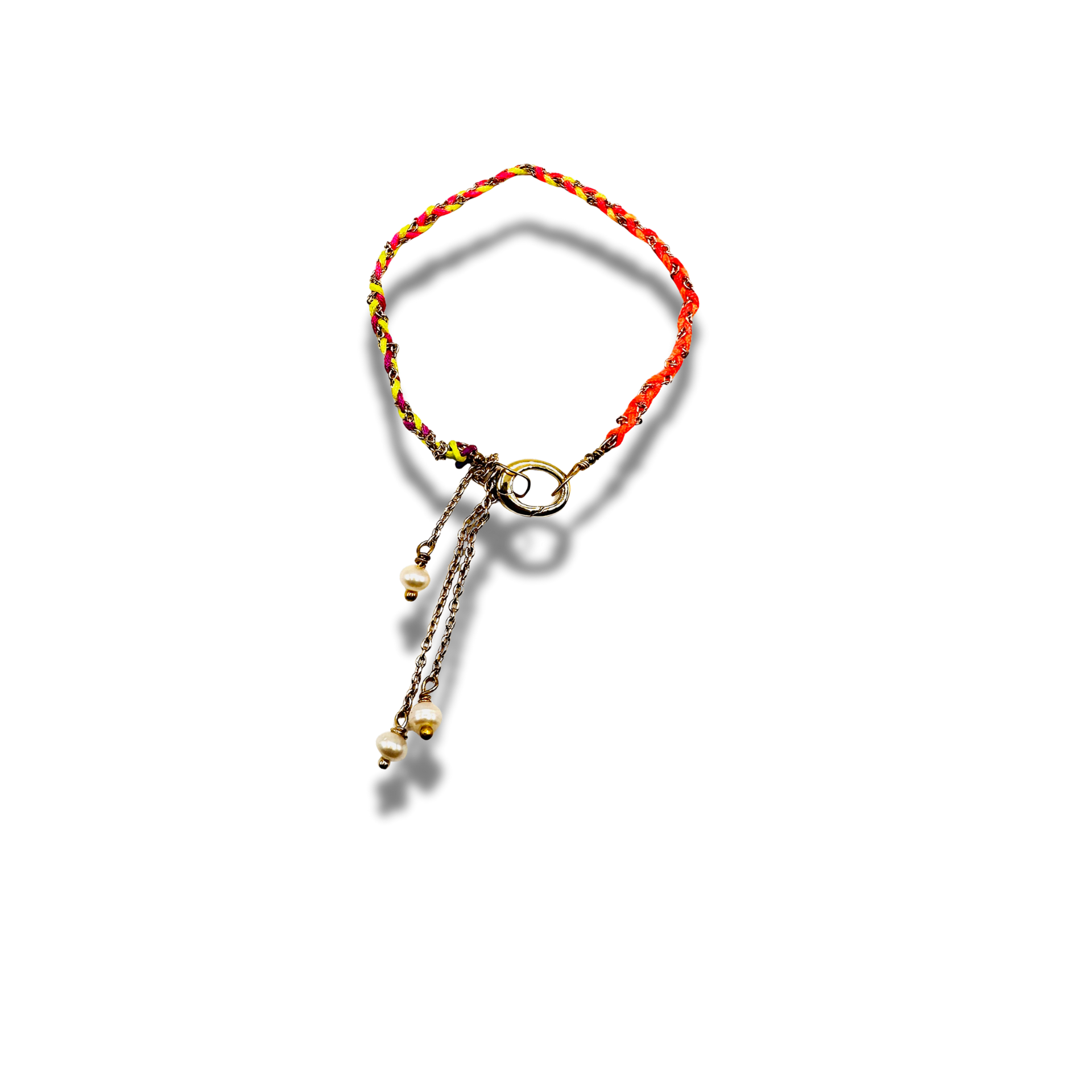 Bracelet with red and yellow beads on a white background