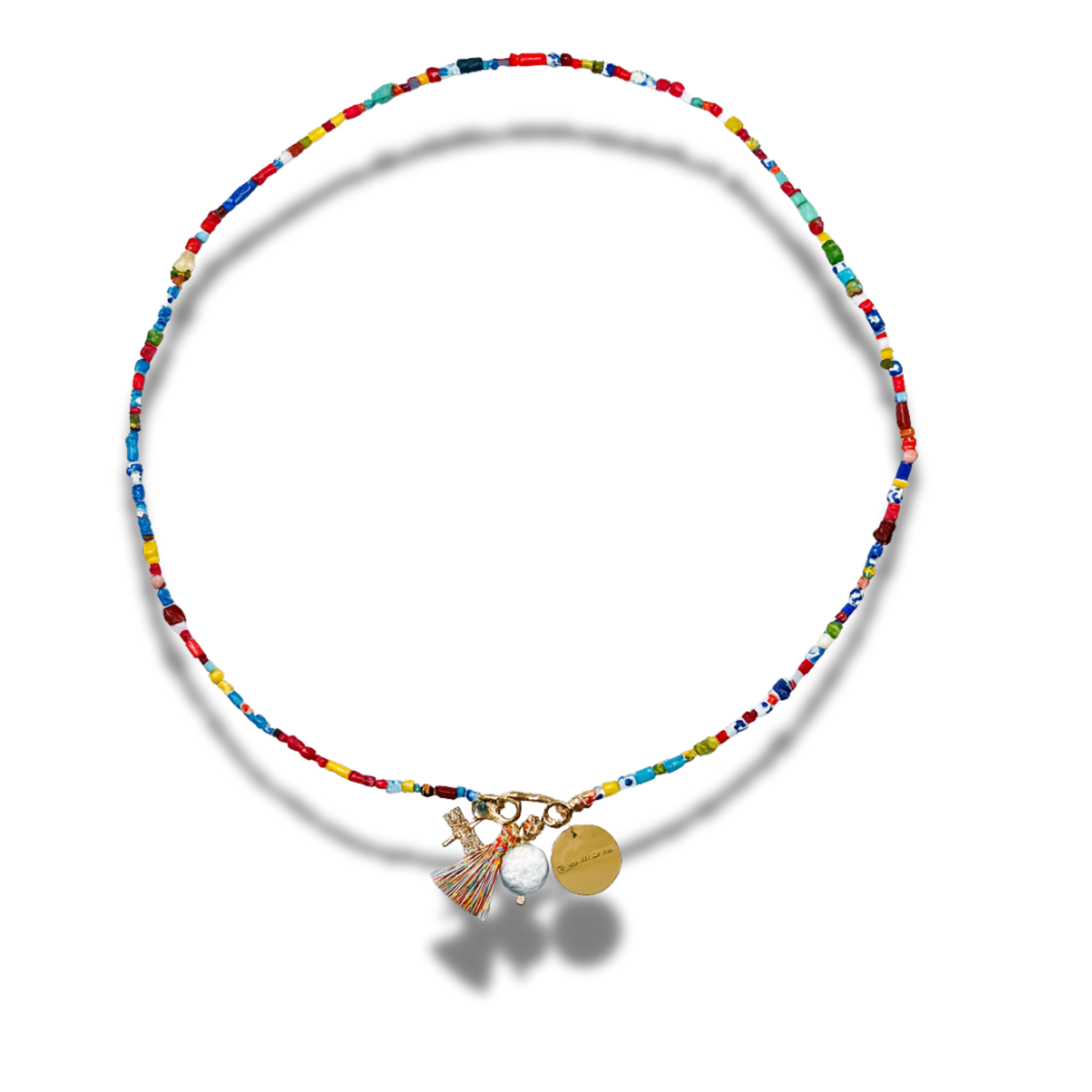 Colorful beaded necklace with charms on a white background