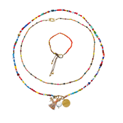 Colorful beaded necklace with charms on a white background