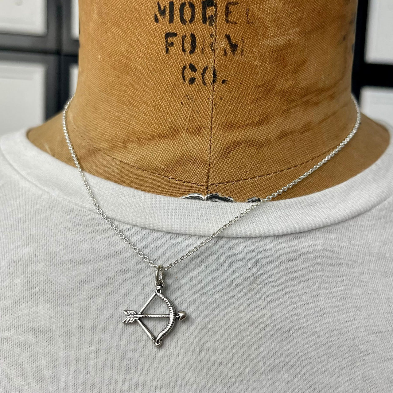 Launch forward with Cupids Arrow Necklace