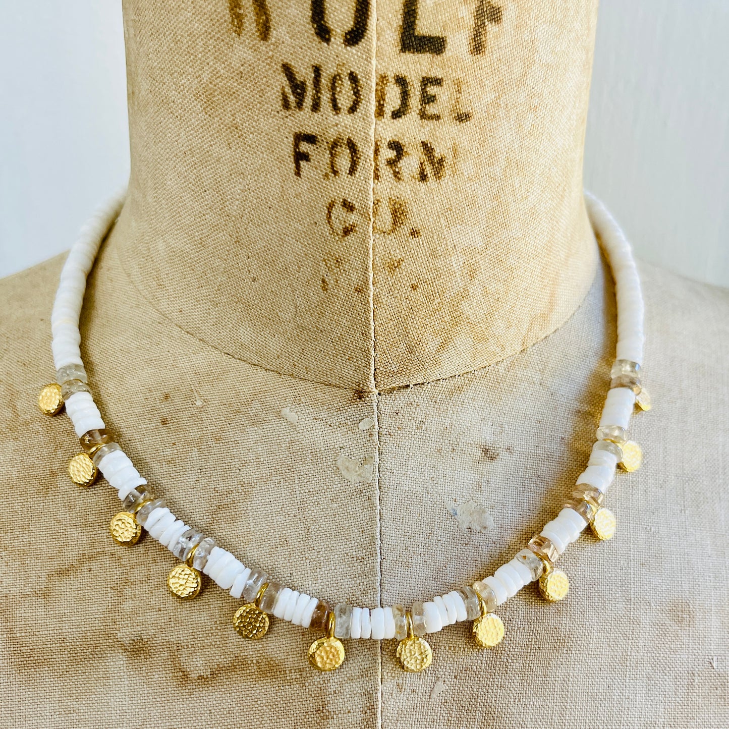 White Heshi Shell Necklace with Brass Drops