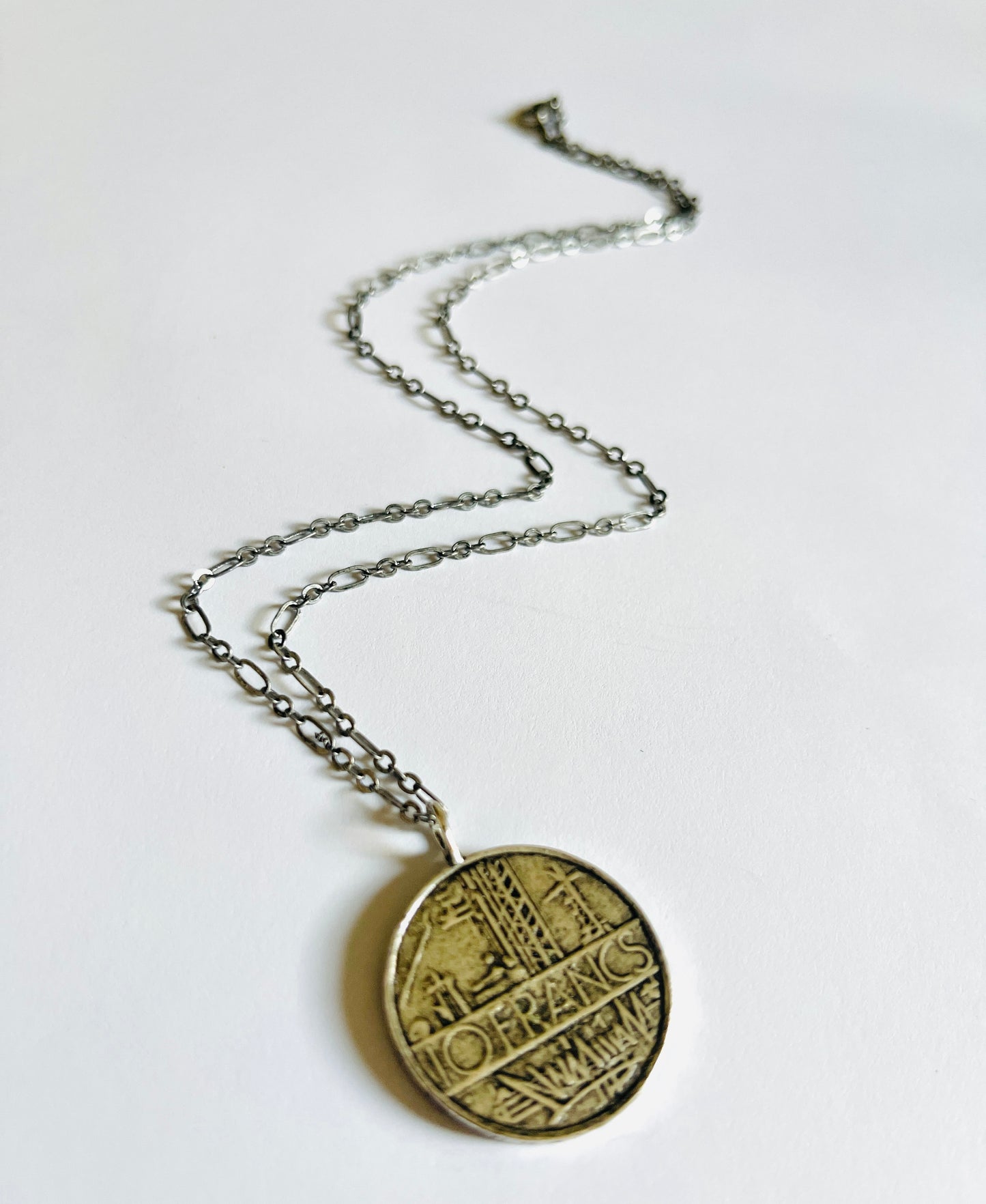 Let Go Hand Stamped French Coin Necklace